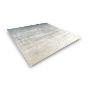 Custom hand-tufted rectangular bamboo silk rug with blue-gray to cream gradient pattern and soft watercolor effect