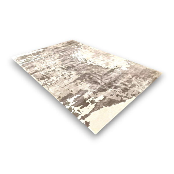 Custom hand-tufted rectangular rayon rug with abstract distressed pattern in brown, beige and cream colors