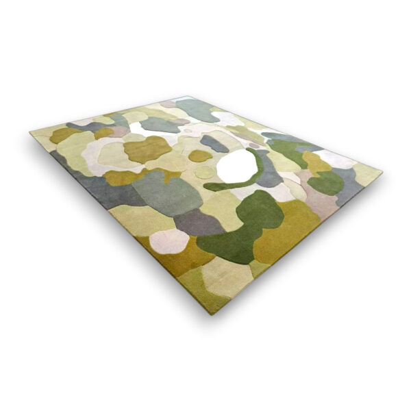 Custom hand-tufted rectangular moss rug with abstract camouflage pattern in green, yellow, gray, and cream organic shapes