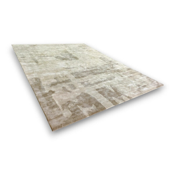 Custom hand-tufted rectangular rayon rug in beige and brown with abstract distressed pattern and weathered appearance