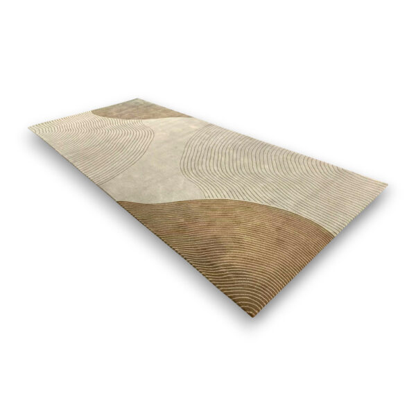 Custom hand-tufted rectangular rug in cream and brown with curved linear topographic pattern