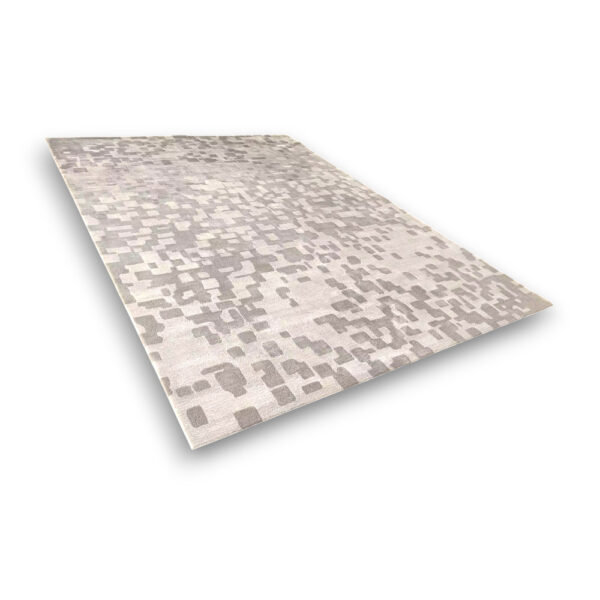Custom hand-tufted rectangular wool rug in beige and taupe with pixelated geometric pattern