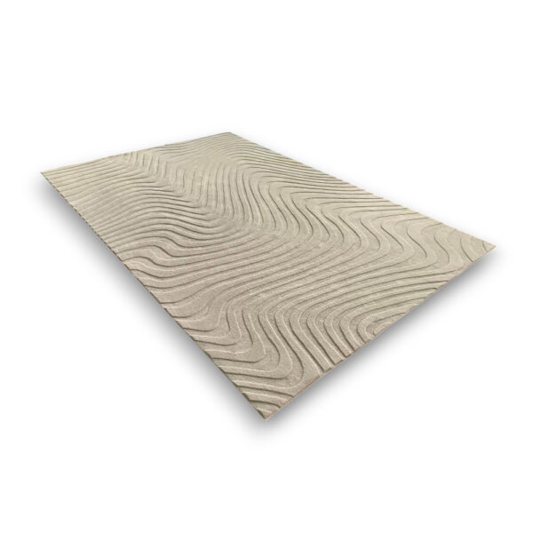 Custom hand-tufted rectangular rug with flowing concentric line pattern in cream and taupe tones