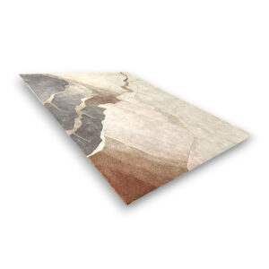 Custom hand-tufted rectangular rug with abstract landscape pattern in grey, brown, cream, and beige with jagged white lines