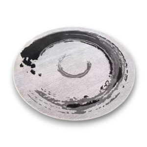Custom tufted round rug featuring black brushstroke spiral design on cream background with artistic paint effect