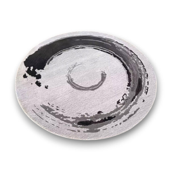Custom tufted round rug featuring black brushstroke spiral design on cream background with artistic paint effect