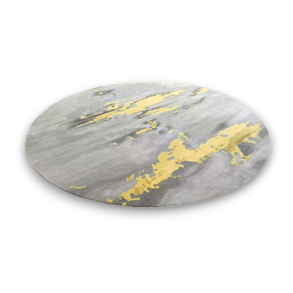 Custom tufted round rug in grey with bright yellow abstract splatter pattern and modern artistic design