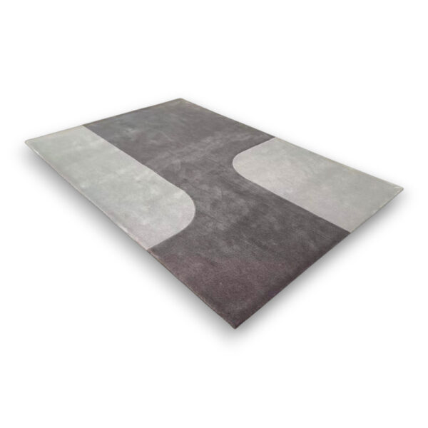 Custom tufted contemporary wool rug in charcoal gray and light beige with modern abstract curved design, rectangular shape