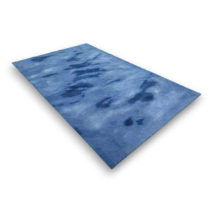 Custom hand-tufted rectangular wool rug in blue with abstract watercolor-style pattern in varying shades of navy and light blue