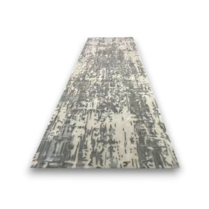 Custom hand-tufted runner wool rug in grey and cream with abstract distressed pattern resembling weathered or vintage texture