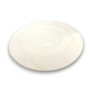 Custom hand-tufted round wool rug in white with subtle concentric circle pattern in varying pile heights
