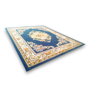 Custom tufted vintage wool rug in blue with ornate cream and gold floral border, featuring central medallion and corner motifs with traditional European design