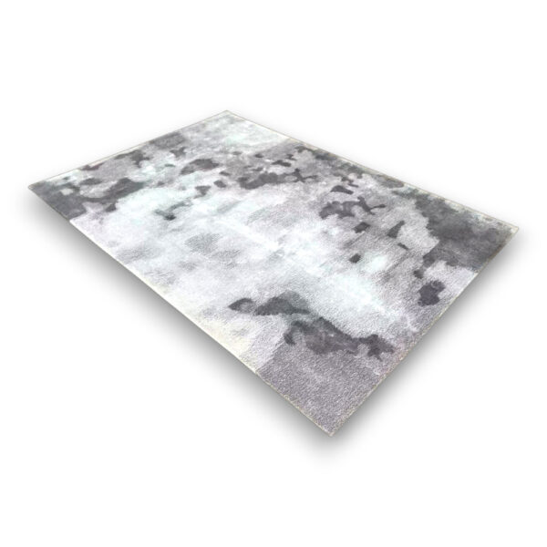 Custom tufted wool rug in charcoal grey and white with abstract cloud pattern, rectangular shape, medium pile height