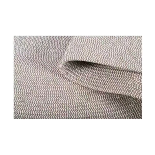 Custom woven gluefree wool rug showing beige and white chevron pattern with finished edge and flatweave construction