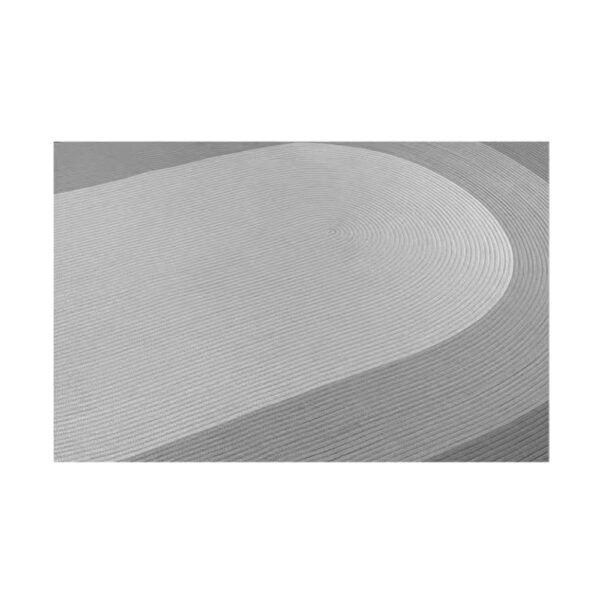 Custom gluefree woven wool rug showing grey and white concentric oval pattern with curved edge and flatweave construction